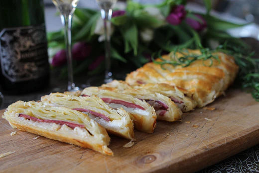 Puff pastry baked hot smoked duck breast with chèvre and pear marmalade